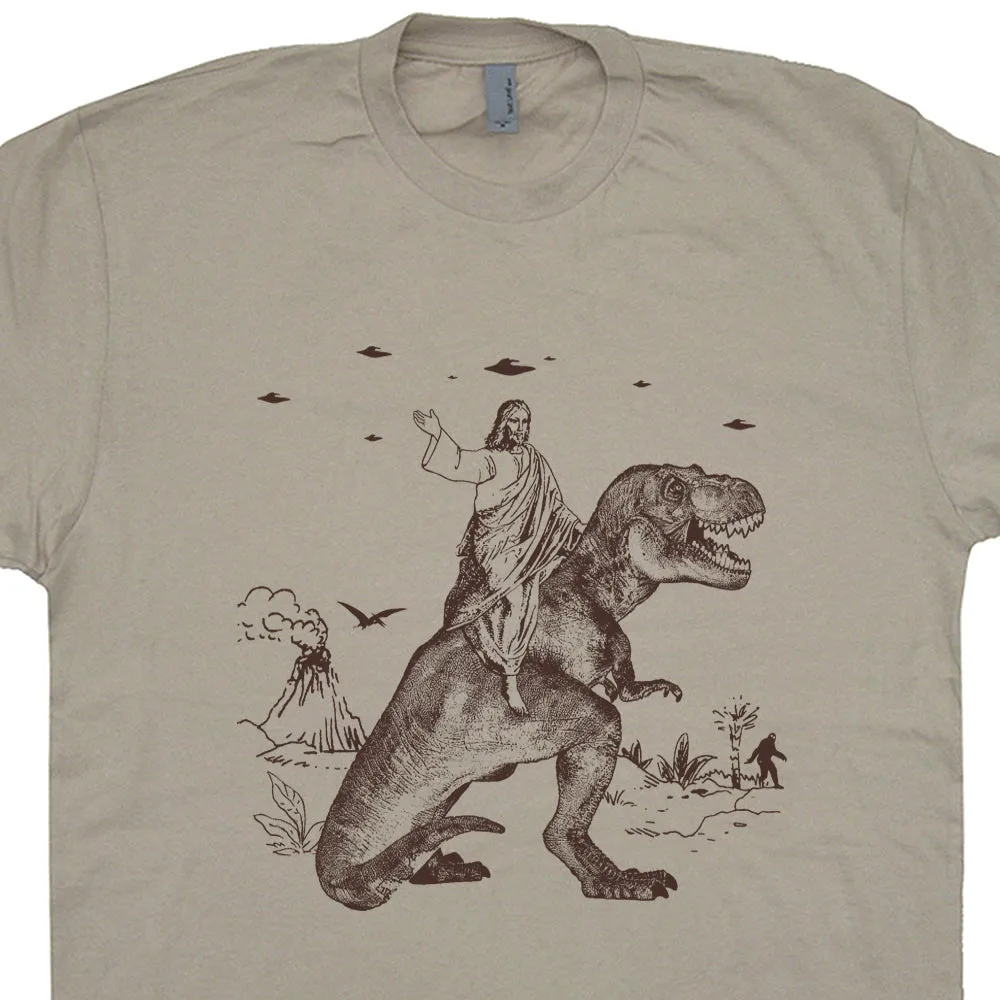 Jesus Riding Dinosaur Shirt Jesus On a Dinosaur T Shirt UFO T Shirt Cryptozoology Tee Shirt