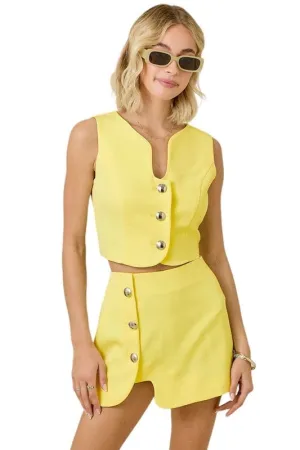 Lemon sleeveless puzzle vest and mini skirt